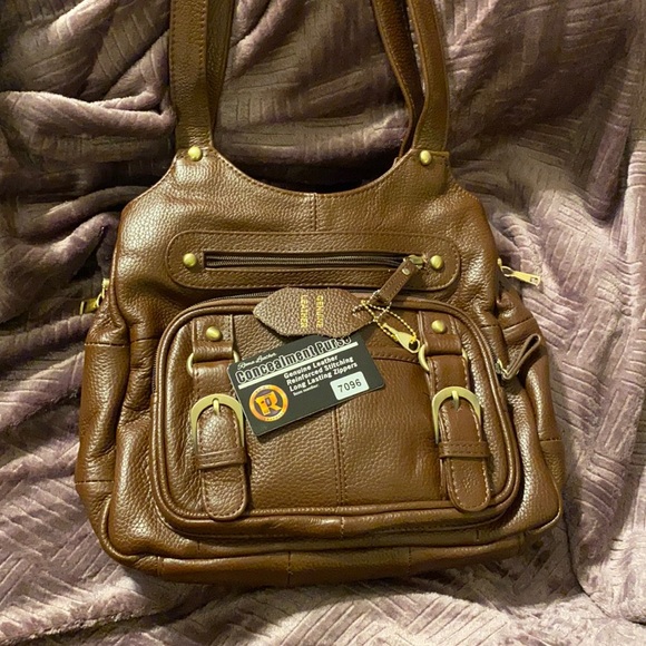 Handbags - Conceal carry purse .. Genuine Leather!  Brand new with tags!!